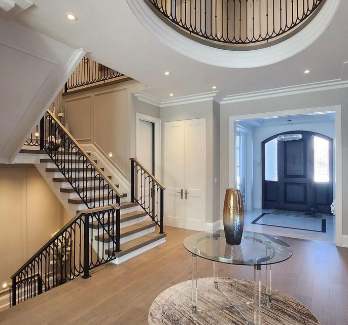 Toronto home flooring, stairs, and
          railing renovated