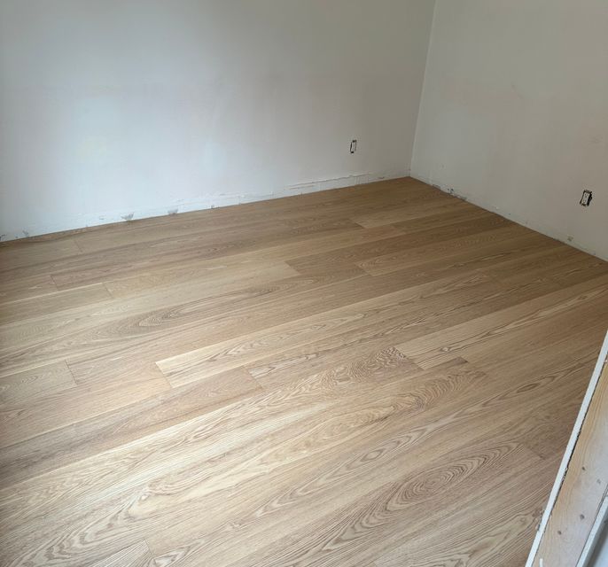 Dark wood installed in bedroom in
          Toronto