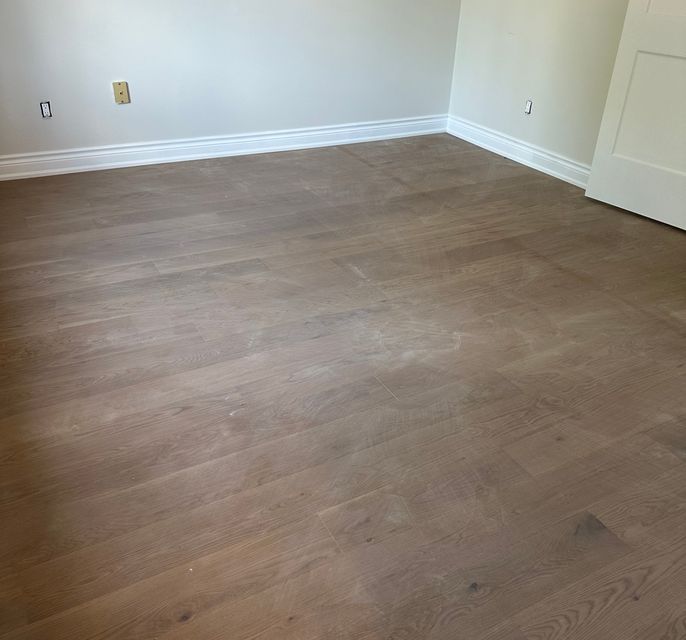 Medium brown wood installed
          in floor