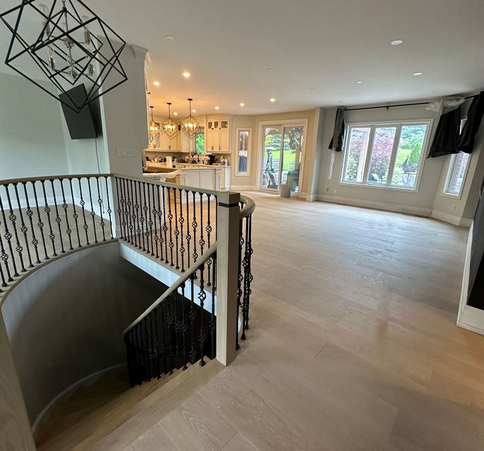 Top level stairs
          with railings connecting to renovated floors